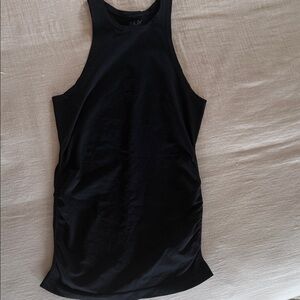 NUX Black high neck Sleeveless Top with Club Pilates Logo on upper back.
